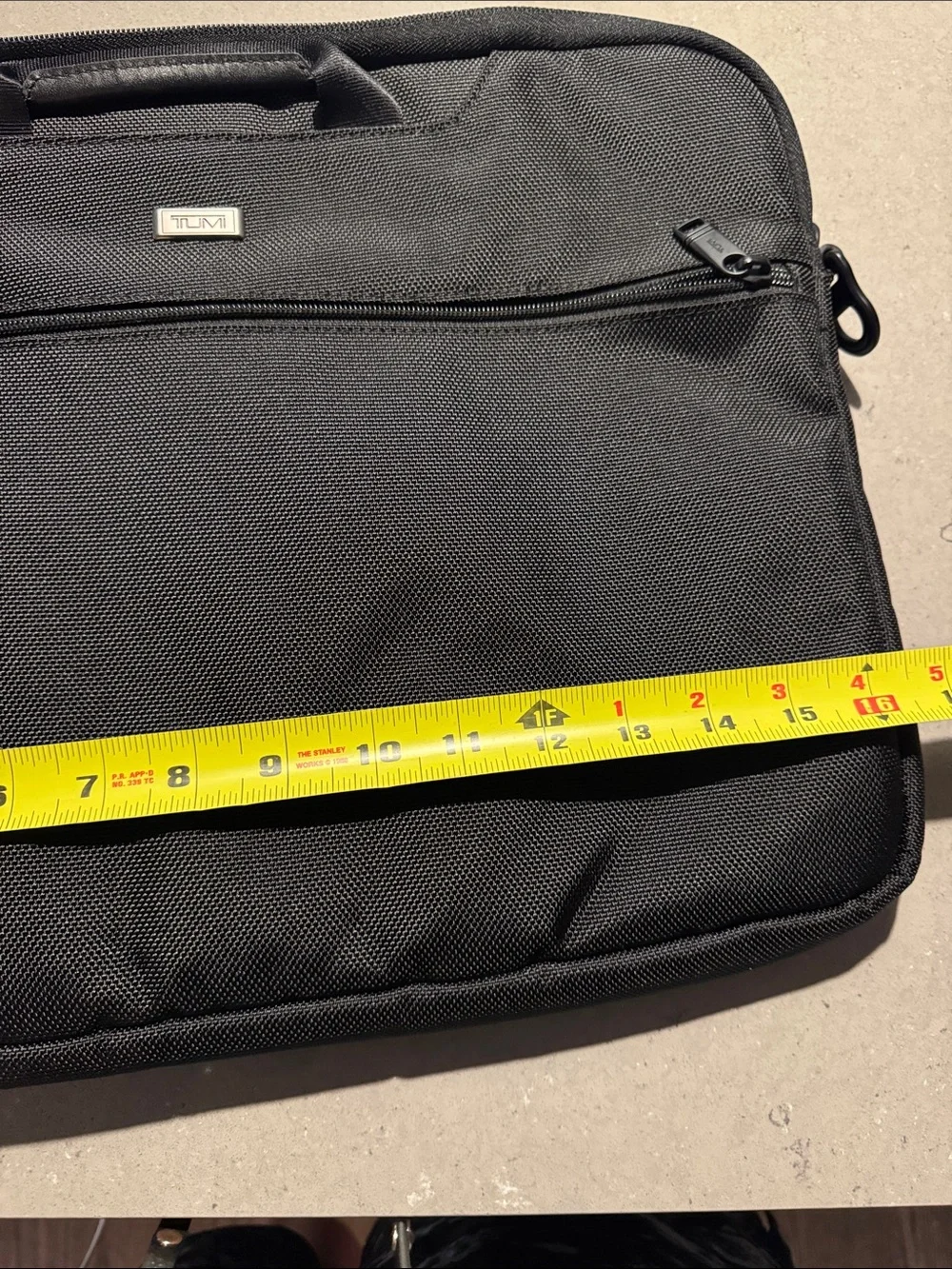 TUMI Black Laptop Briefcase - Sleek Professional Carrying Case